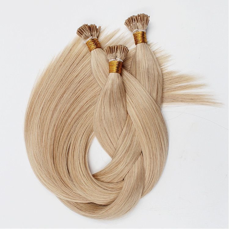 Three flat tip extension strands with keratin tips and gold binding